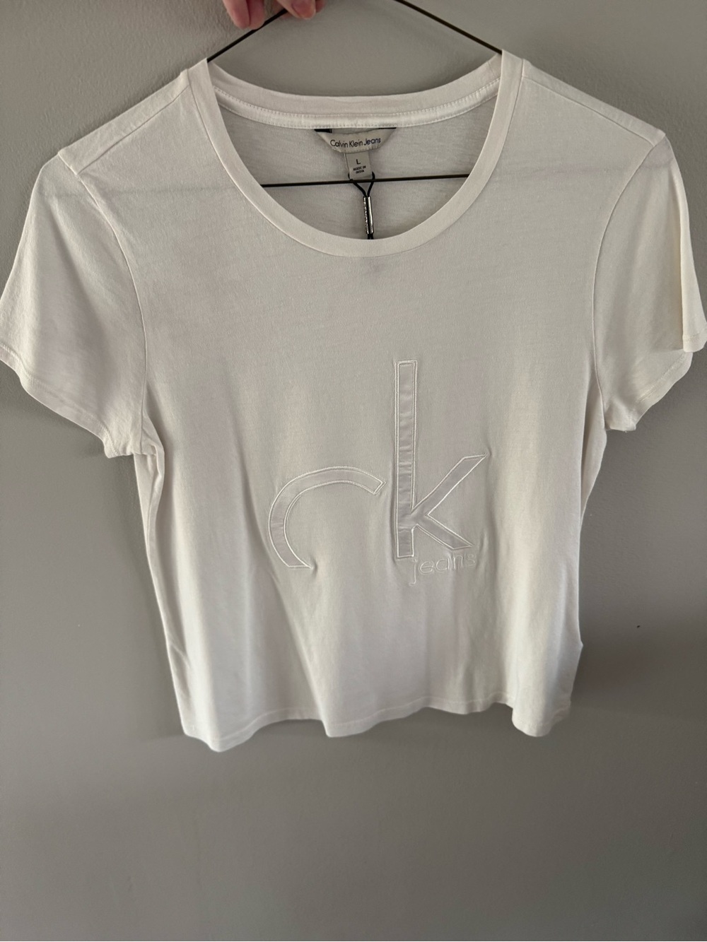 Calvin Klein Exercise Tee Womens White Embossed Logo Tee Athletic performance